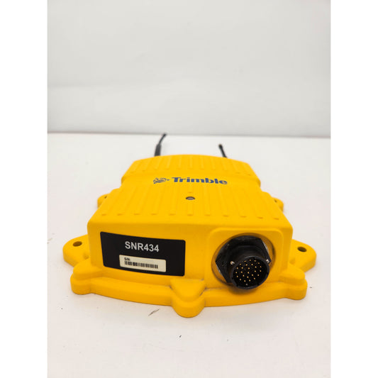 Trimble SNR434 front view showing 16-pin system connector.
