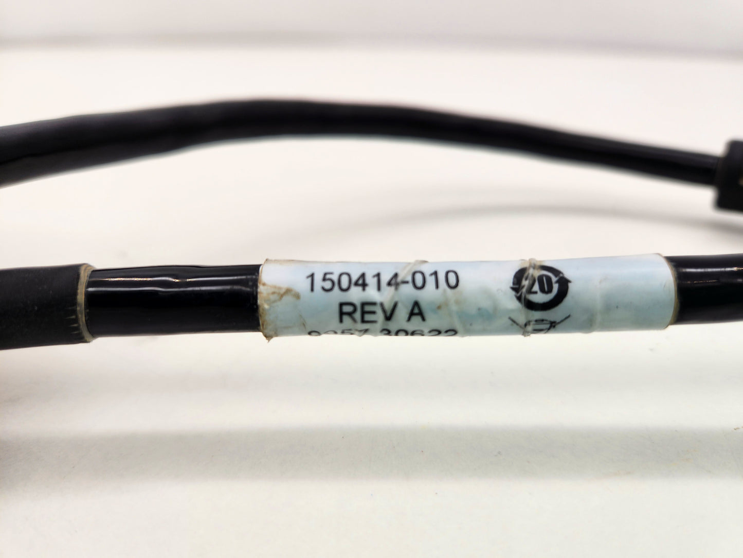 Close-up of the printed part numbers on the Trimble cable sleeve.