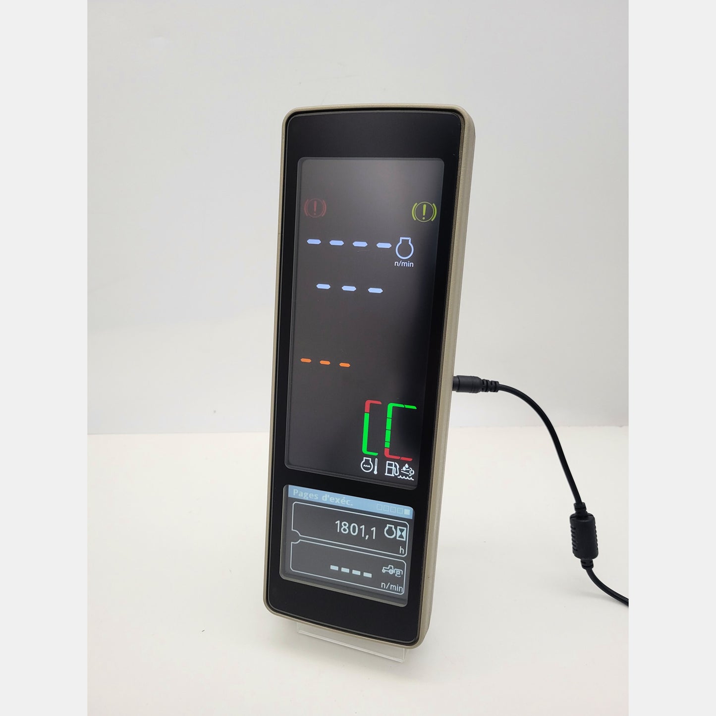 John Deere PDU Plus tractor dashboard display PH85240729 with active digital screen showing RPM and machine diagnostics.