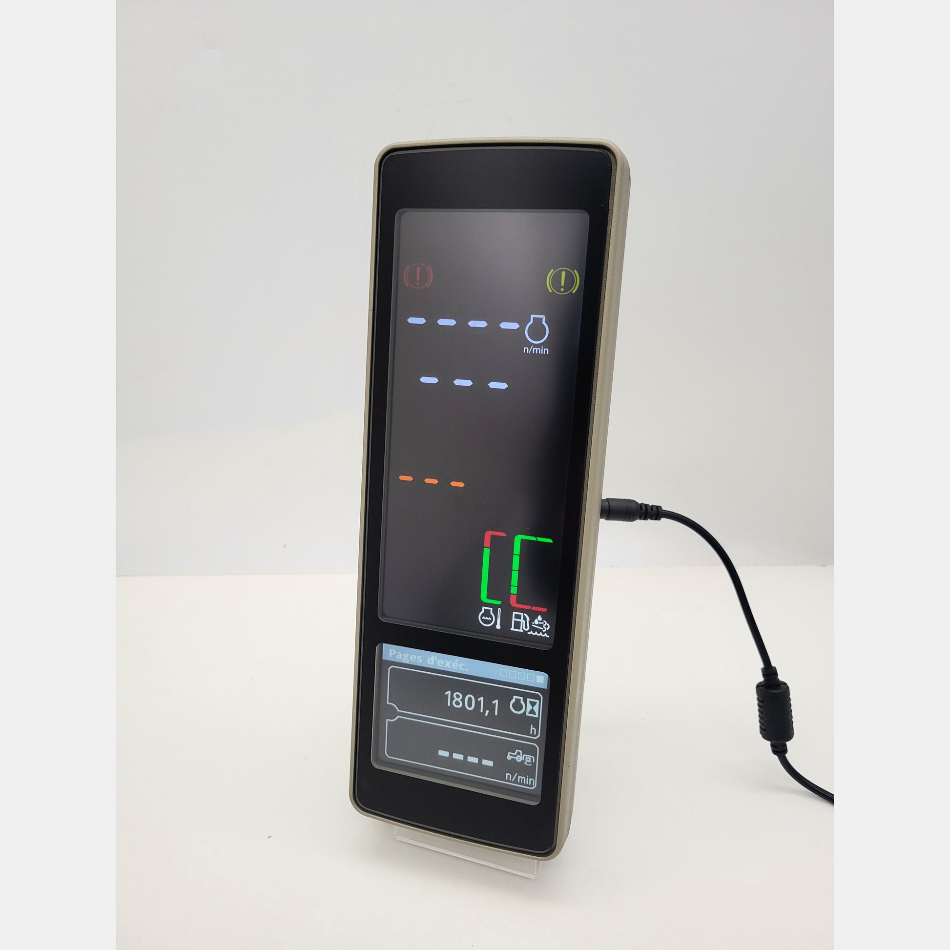 John Deere PDU Plus tractor dashboard display PH85240729 with active digital screen showing RPM and machine diagnostics.