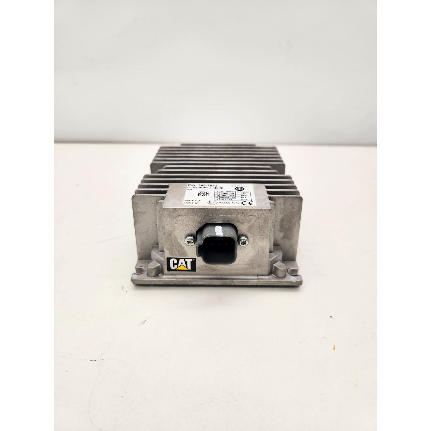 Caterpillar 348-7842 Power Converter label showing voltage specs and part number.
