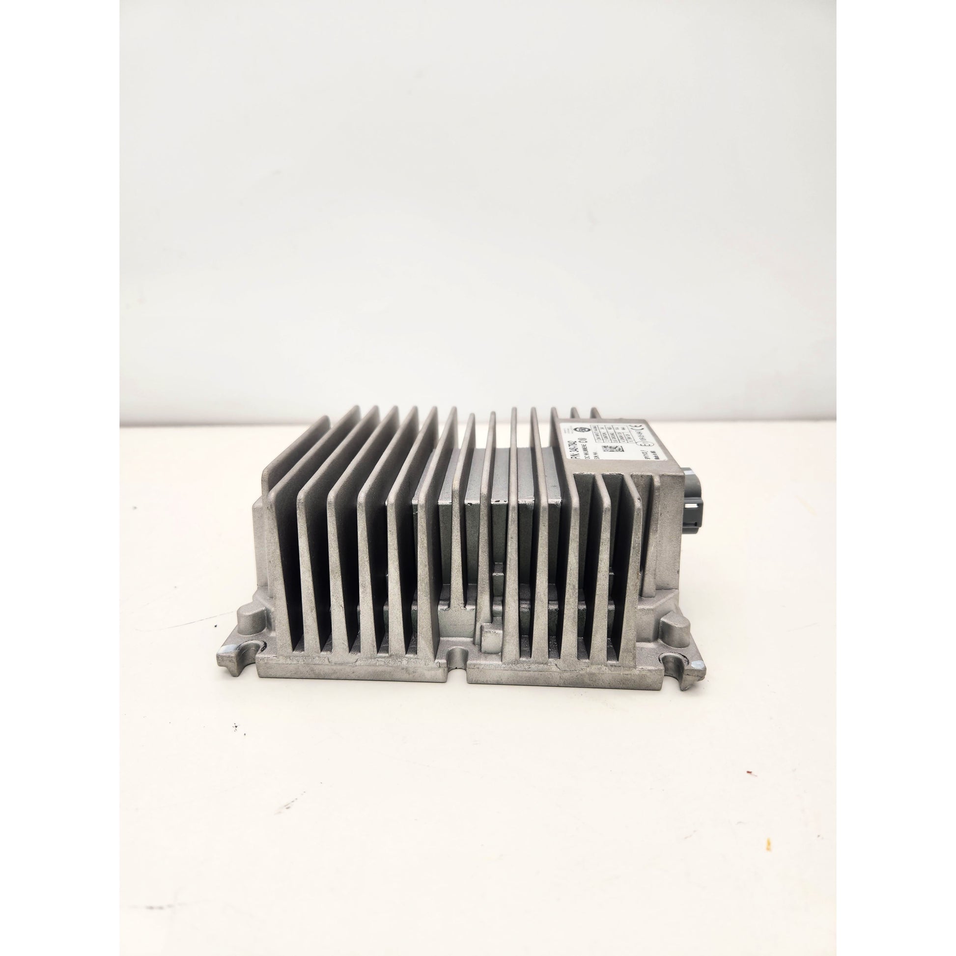 Caterpillar 348-7842 Power Converter label showing voltage specs and part number.