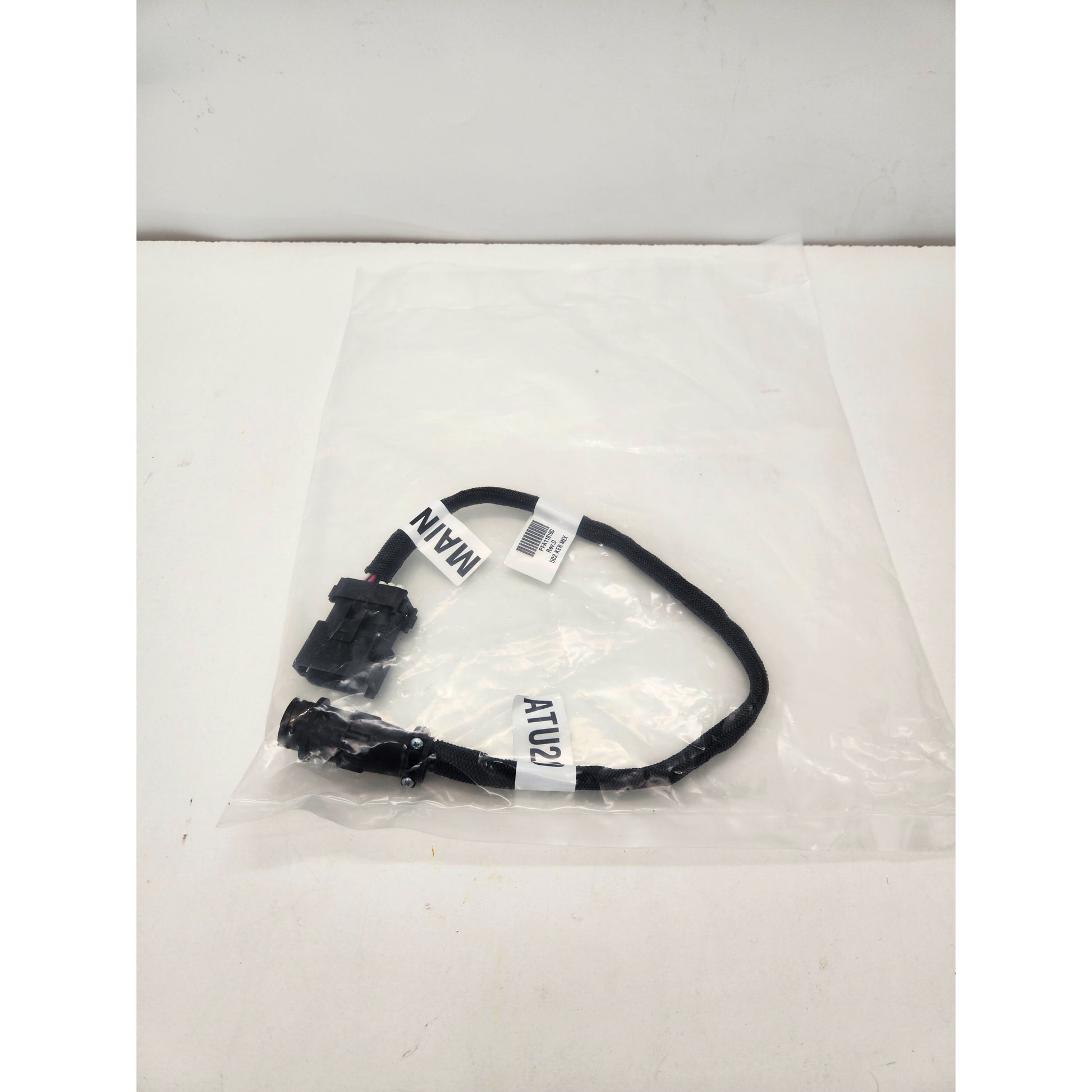 John Deere PFA11819 adapter cable with original part number tag and "KER MEX" label.