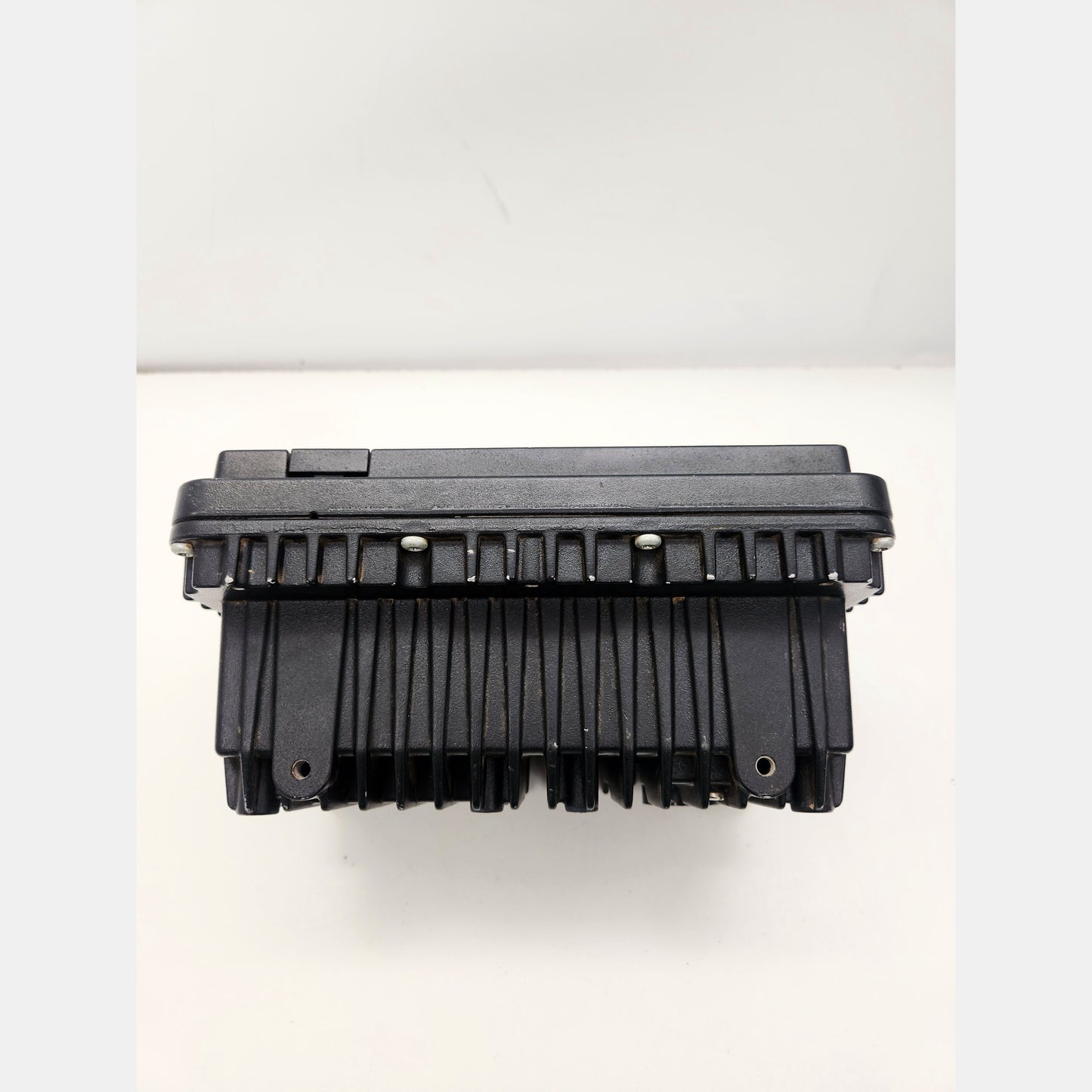 Side view of CAT CD700 display showing rugged housing and connectors.