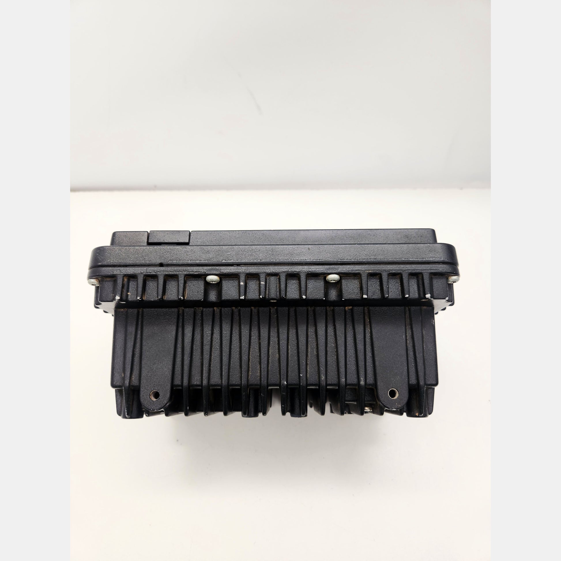 Side view of CAT CD700 display showing rugged housing and connectors.