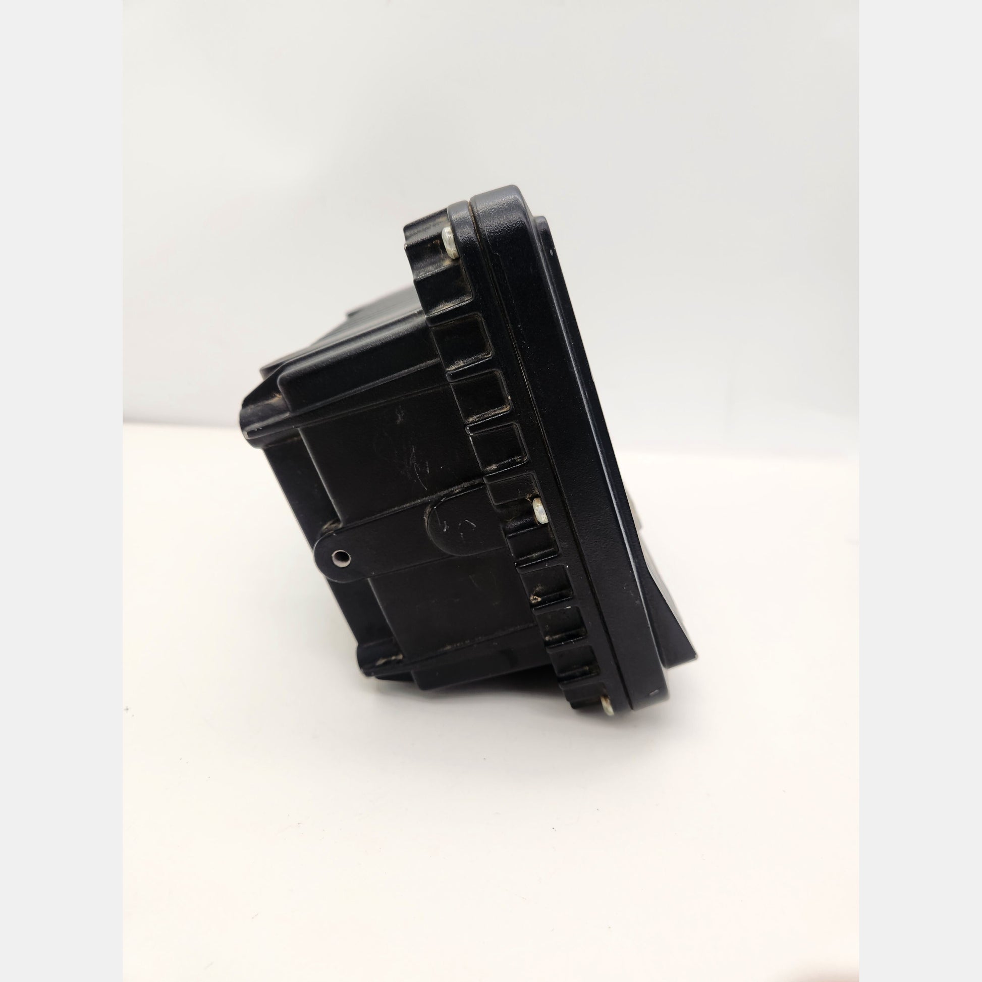 Side view of CAT CD700 display showing rugged housing and connectors.