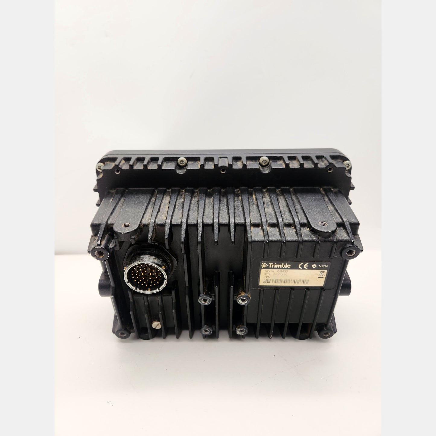 Side view of CAT CD700 display showing rugged housing and connectors.