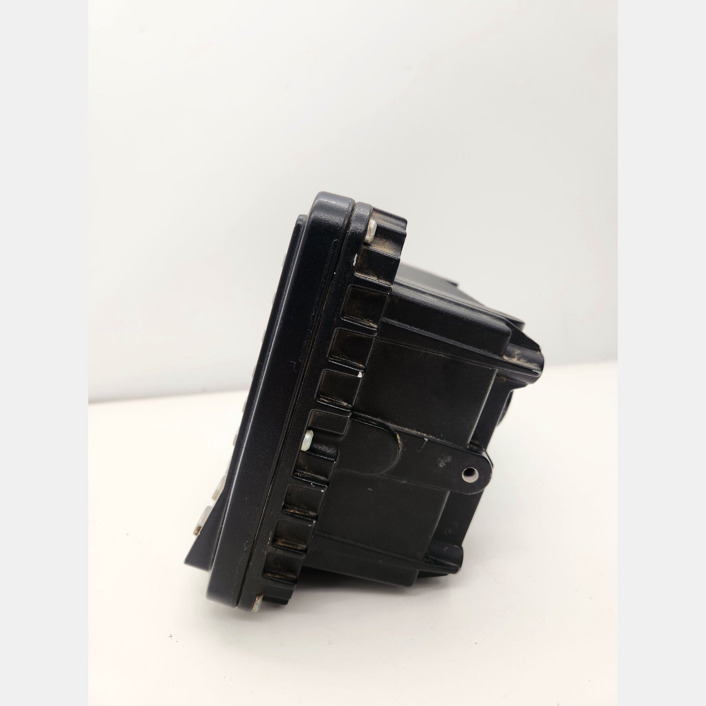 Side view of CAT CD700 display showing rugged housing and connectors.