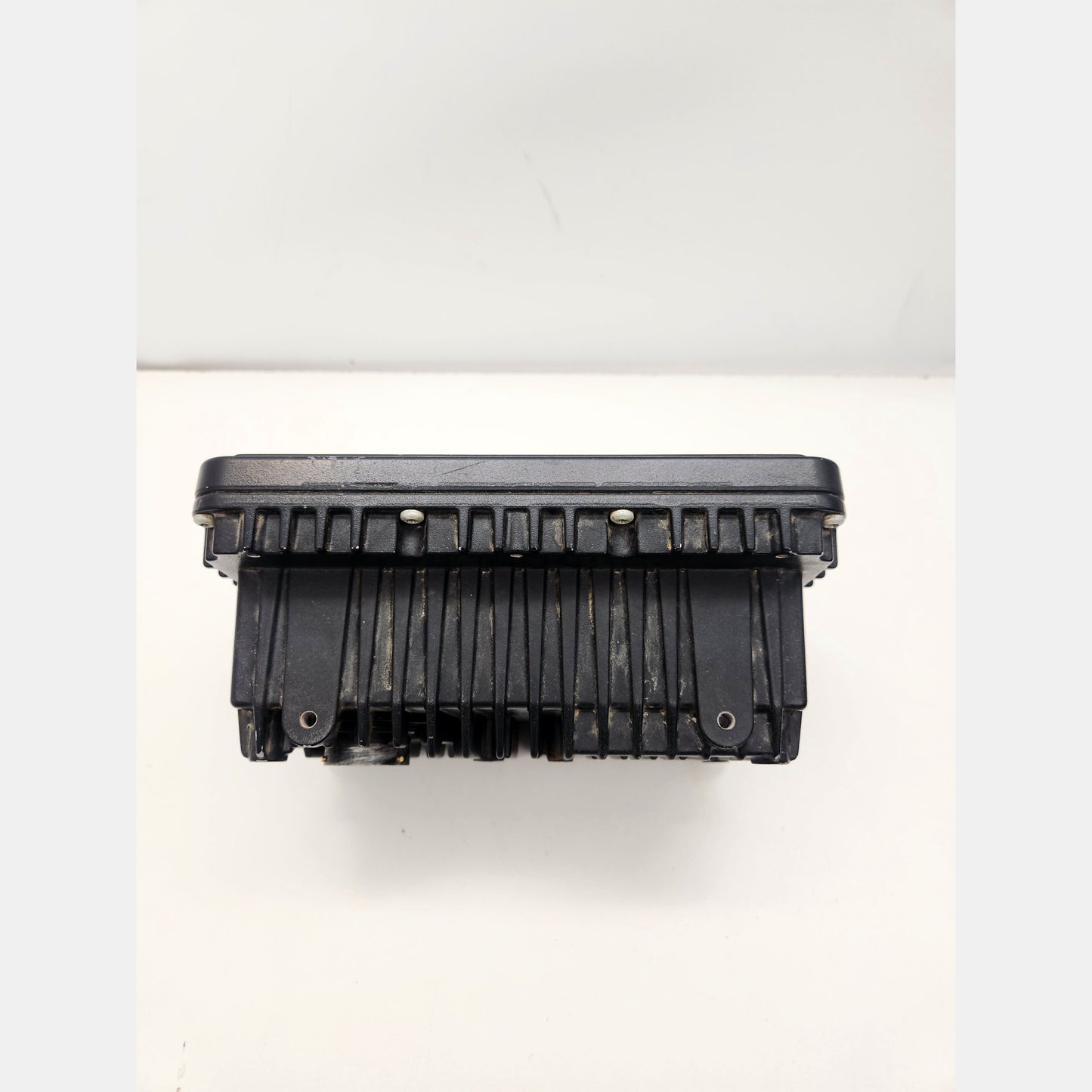 Side view of CAT CD700 display showing rugged housing and connectors.