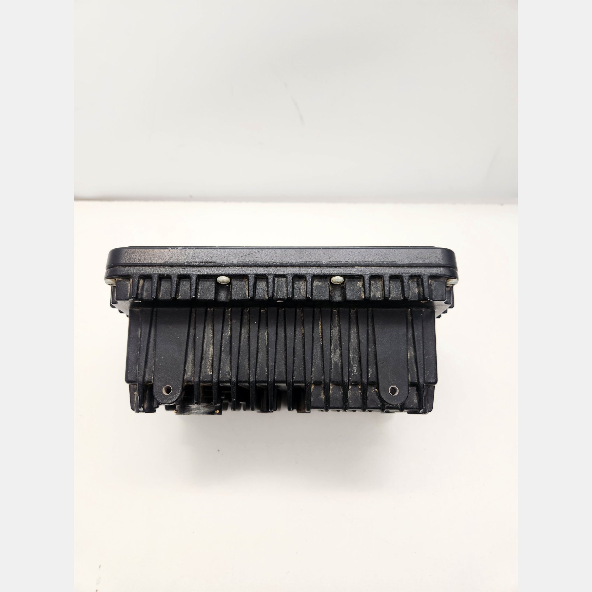 Side view of CAT CD700 display showing rugged housing and connectors.