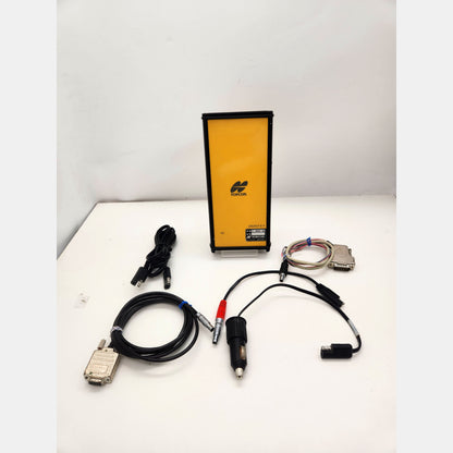 Topcon Legacy-E+ GNSS receiver with full cable set on white background.