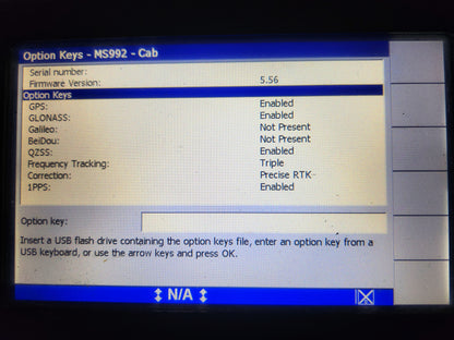 Diagnostics screen of CAT MS992 showing enabled option keys: GPS, GLONASS, QZSS, Triple Frequency Tracking, and Precise RTK.