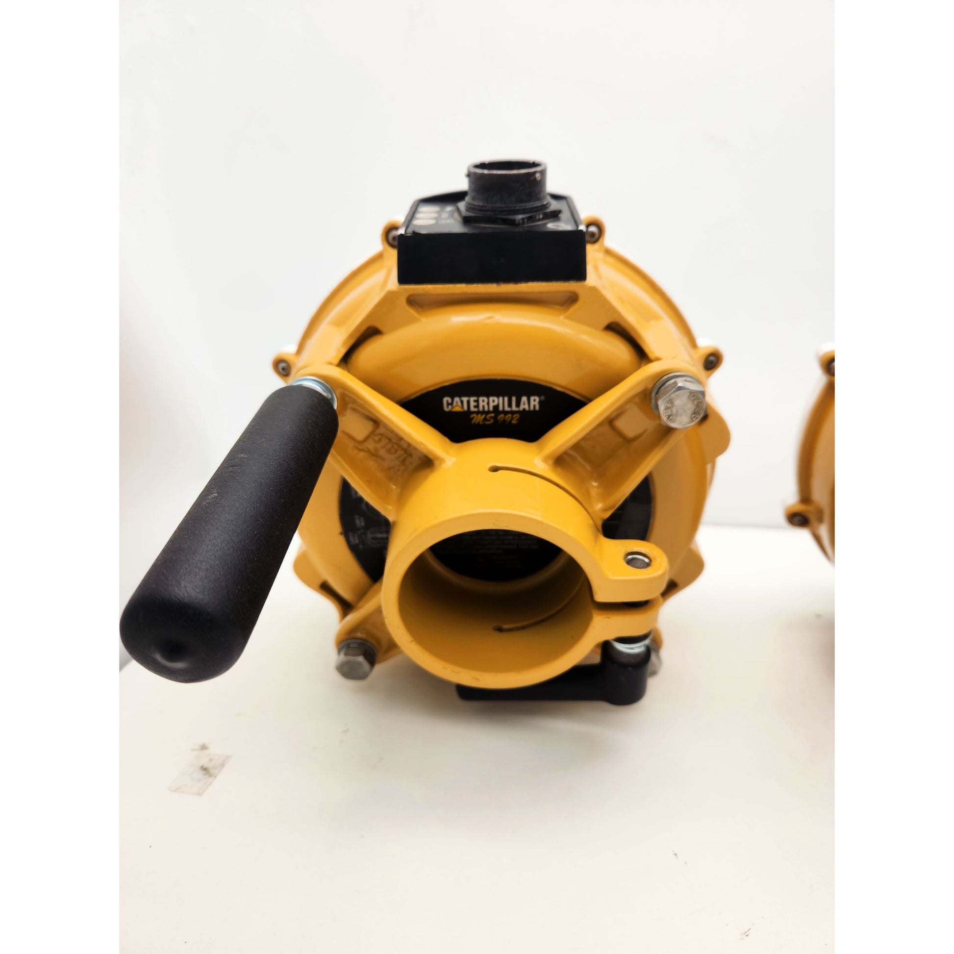 Caterpillar MS992 Smart Antennas with 2 professional mast mounts and handles for easy installation on dozers or graders.