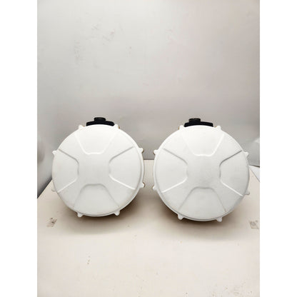 Top view of two CAT MS992 GNSS antennas with white radome covers, part of a dual-antenna 3D grading kit.