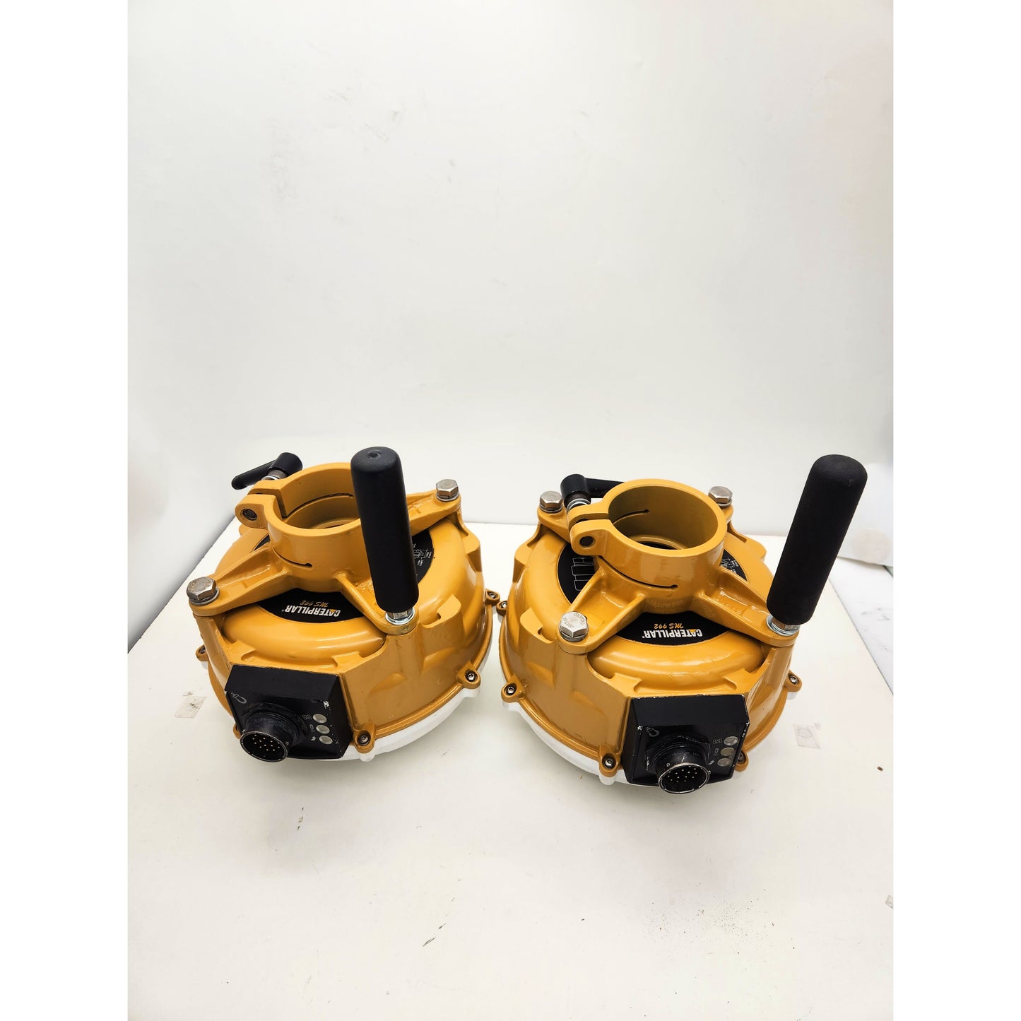 Caterpillar MS992 Smart Antennas with 2 professional mast mounts and handles for easy installation on dozers or graders.A