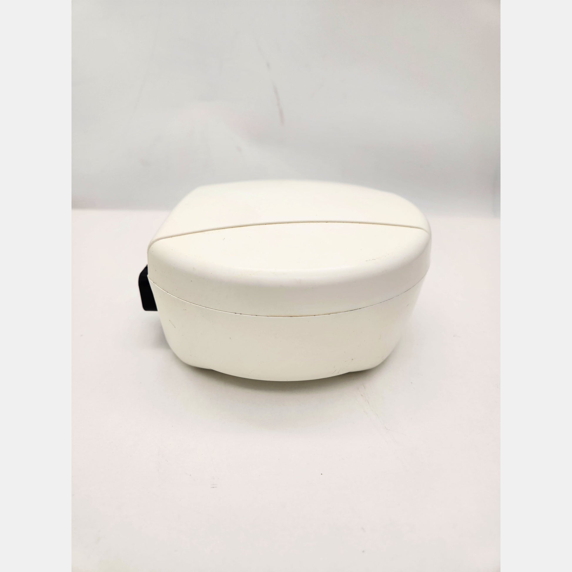 Front and side view of NovAtel Smart6 GNSS Antenna